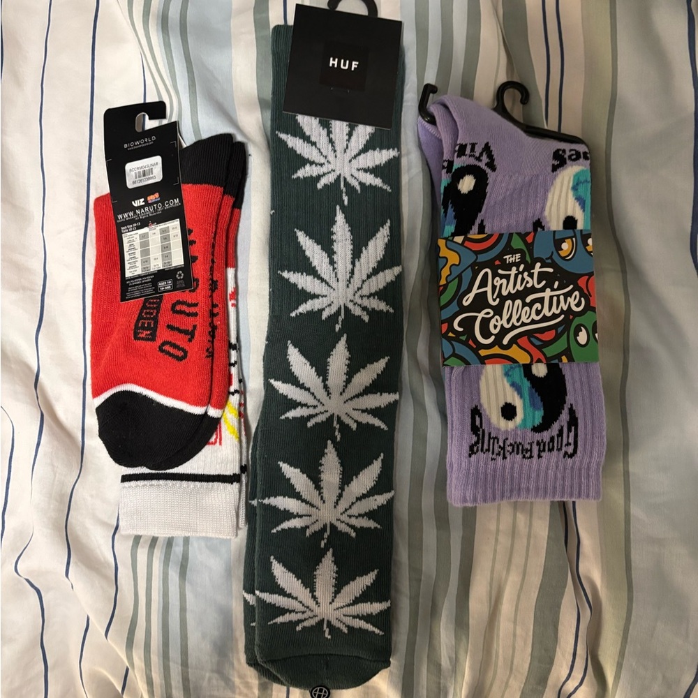 Assorted mid calf crew socks. Unisex.